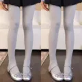 Children’s ribbed stretch tights in light gray, styled with a black pleated skirt and silver shoes - Bottoms / 2 Pieces/Pack / Light Gray
