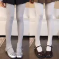 White vertical-ribbed knit tights shown in two shades with silver and brown Mary Jane flats - Bottoms / 2 Pieces/Pack / Milky White + Light Gray