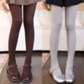 Ribbed vertical-stripe tights in dark coffee brown and light gray, styled with Mary Jane shoes - Bottoms / 2 Pieces/Pack / Coffee + Light Gray