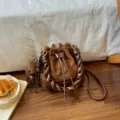 Brown suede bucket bag with diamond stitching, braided handle, adjustable strap and bear charm - With Pendant / Brown