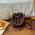 Dark brown suede-look bucket bag with braided faux-leather handles, gold-tone hardware and drawstring - No Pendant / Coffee