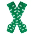Crossed green knit leg warmers with white shamrock motifs, displayed against a white background - Fingerless Arm Sleeves / Green White Butterfly Sleeves