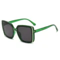 Large square sunglasses with translucent green plastic frames and dark gray lenses, shown at an angle - Transparent Green Frame Grey Lens