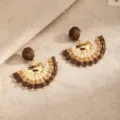 Close-up of two semicircular woven earrings in brown, tan and ivory, with small gold accents - Coffee (E6072-6)