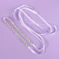 White satin bridal dress belt with clear rhinestone embellishments, laid flat with ribbon ties - Luxury Daily Rhinestone Style (WS-J058S)