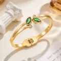 Gold-tone steel cuff bracelet with green marquise-shaped stones and clear crystal accents - Green (SZ6143)