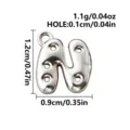 Silver 316L stainless steel bubble-letter N charm with a top loop and four small holes - Letter N / Steel