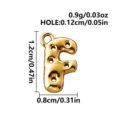 Gold-tone stainless steel letter F charm with glossy balloon styling and decorative openwork holes - Letter F / Gold