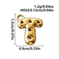 Gold-tone 316L stainless steel bubble letter T charm with a glossy finish and multiple holes - Letter T / Gold