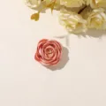 Close-up of a pink satin fabric rose with tiny pale-gold bead accents at its center - Style 12(A29--5-5-8) / 1 Piece Pack