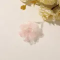 Overhead view of a pink tulle and lace flower with tiny white pearl accents, on a cream background - Style 29(A75-3-14-19) / 1 Piece Pack