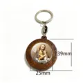 Close-up of a wooden medallion with a domed St. Joseph icon, metal cross charm and key ring - St. Joseph Glass Dome Style (Style 2)
