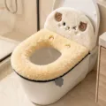 Close-up of a fluffy sheep-face toilet seat cover with embroidered “Sheep” lettering and zipper edge - Sheep / Yellow
