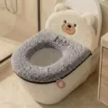 Plush bear-shaped toilet seat cover with a gray fuzzy ring, zipper and pink hanging loop - Teddy Bear / Gray