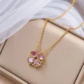 Goudkleurige klaverketting met vier roze hartvormige stenen en een fijne schakelketting - Klavertjevier Hart Hanger (X0178) / Roze
