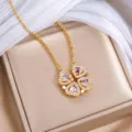 Goldfarbene Kleeblattkette mit weißen Steinen und violetten Tropfensteinen in einer Schmuckbox - Gold Lila (X2967) / Gold + Lila