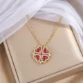Goldfarbene Halskette mit vierblättrigem Herzanhänger, roten Steinen und klaren Schmucksteinen - Herz (X0893) / Gold + Rot