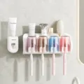 White wall-mounted toothbrush organizer with automatic toothpaste dispenser and four tinted cups - 4 Cups Toothbrush Holder + Dispenser