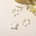 Three white five-petal fabric flowers with center holes arranged flat on a light background - 1 Piece / Beige