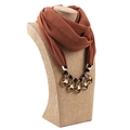 Caramel chiffon scarf necklace with amber crystal beads on a beige jewelry display - Champagne