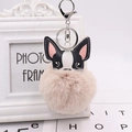 Close-up of French bulldog pompom keychain in multiple colors with silver metal hook - Silver 8-Shape Clasp / Nude