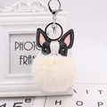 Detail of cute puppy plush ball keychain with faux leather and soft white fur pompom - Silver 8-Shape Clasp / Beige