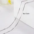 Polished silver box chain necklace displayed on a white textured jewelry box - Box Chain Only