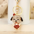 Golden puppy keychain with white rhinestones and red enamel Wang character charm - Red Lucky Puppy
