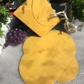 Detailed view of yellow pearlescent envelope with a unique heart-shaped closure design - Pearlescent Yellow