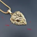 Detailed macro view of large gold-plated lion head pendant with crystal eyes and 54mm height - Large
