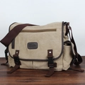 Khaki canvas messenger bag with brown straps and buckle closure for casual daily use - Khaki (With Logo)