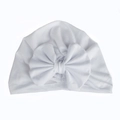 Detailed view of baby white cotton turban hat featuring a large soft decorative bow - White