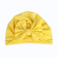 Dettaglio del turbante giallo in cotone per neonati con grande fiocco e trama in maglia fine - Giallo