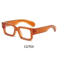 Montura quadrata spessa in colore tè alla moda con rivetti in stile vintage - Tè Trasparente