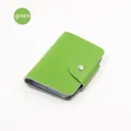 Green leather card holder with multiple PVC slots and secure metal snap button closure - Green