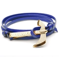 Detail of blue leather multi-layer bracelet with gold textured axe clasp on white background - Blue