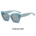 Occhiali da sole cat eye con montura blu traslucida e lenti grigie alla moda - Montatura Blu Lenti Grigie