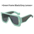 Oversized mint green futuristic sunglasses with dark grey lenses and gold accents - Green Frame Grey Lens