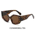 Cat eye polygoon zonnebril met schildpadmontuur en thee-gekleurde lenzen - Schildpad Frame Thee Lenzen