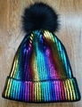 Rainbow metallic knit beanie for women featuring a black faux fur pompom decoration - Adult / Colorful