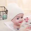 Soft white ribbed knit beanie for toddlers, elastic warm winter hat for babies 1-5 years - Adjustable / Soft White