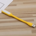 Portable mini USB night light in yellow with flexible neck on a wooden background - Yellow