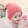 Pink knitted baby winter beanie in soft candy color for toddlers aged 1 to 5 years - Adjustable / Dark Pink