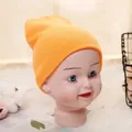 Bright orange knitted beanie for toddlers 1-5 years with soft ribbed texture - Adjustable / Orange