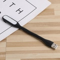 Portable black USB LED light with flexible neck on a wooden surface - Black / Bare Unit