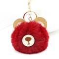 Detail view of red plush bear keychain with khaki leather ears and gold metal clasp - Burgundy