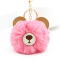 Detailed view of pink faux fur bear keychain with golden metal ring and lobster clasp - Deep Pink