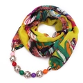 Detail of colorful chiffon scarf necklace with vibrant abstract print and beaded pendant - Yellow Sun