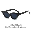 Occhiali da sole cat eye con montatura nera lucida e lenti grigio scuro vista 45 gradi - Montatura Nera Lenti Grigio Nero