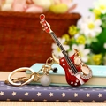 Sparkling red electric guitar keychain with rhinestones and gold-tone metal ring - Romantic Guitar